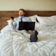 Man relaxing in upscale Vegas hotel room, preparing to book a companion